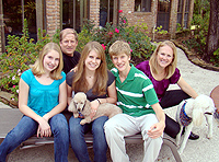 Darwin family: (L to R) Sarah (Grade 8), Kristin (Class 2011 Yale), Tyler (Grade 11), with Barnes and Pam behind.