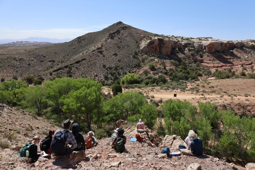 Students sketching in Bartlett Wash near Moab, Utah. The site features a fault where the geology abruptly changes. The students are sketching the area to understand the relationship between the fault, strata, and topography so they can eventually fill their geological map. Credit: Nicola Tisato.