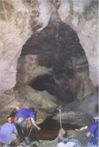 Tom Zannes' posterior filming the bacterial mats at the Upper Spring.