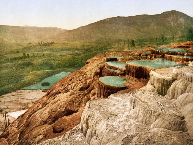 A 1898 photochrom print of Pulpit Terrace at the Mammoth Hot Springs at Yellowstone National Park.