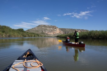 View looking down-river in the early afternoon of day one. Jeff Sitgreavs and Nick Danger are ready for the next series of rapids. 