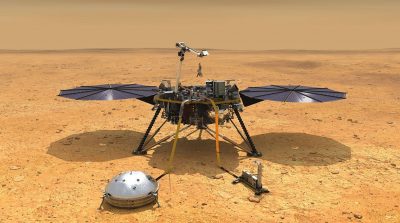 Artistic rendering of the lander on the Martian surface with its legs and solar panels deployed.