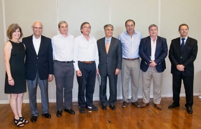 With a focus on expanding and driving international energy research, President Fenves spoke briefly to attendees of the United States and Argentina Energy Forum at The University of Texas at Austin. The forum is an opportunity to exchange ideas and information about the development of energy resources in Argentina and the U.S. Pictured from left to right: Melinda Taylor, executive director of the Kay Bailey Hutchison Center for Energy, Law and Business; Jorge Piñon, director of UT Austin’s Latin America and Caribbean Energy Program and the Center for International Energy and Environmental Policy; Alejandro Diaz, CEO of Amcham Argentina; Alex Bottan, CEO of Southern Cone General Electric (GE) and former president of Amcham; President Fenves; Rodolfo Urtubey, National Senator for Salta State and member of the Energy Senate Committee; Alejandro Nicola, energy minister of Neuquen State, Argentina; and Daniel Deodato, consul general for Argentina in Houston.