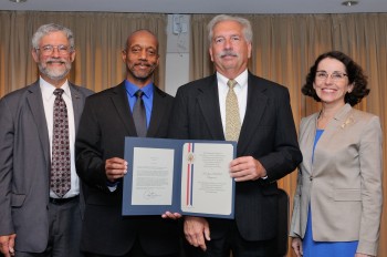 Moore and Ratcliff receive the award from OSTP Director John Holdren and NSF Director France A. Córdova. National Science Foundation.