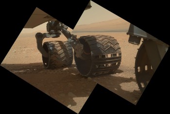 Curiosity with Mount Sharp in the distance. 