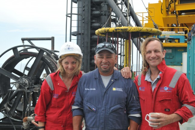 Co-principal investigators Joanna Morgan and Sean Gulick with L/B Myrtle crew member Isaias Alamilla (middle) 