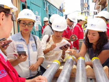 Reporters ask questions to scientists aboard the Myrtle.