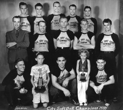 Jack (top row, second from right) with softball team. 