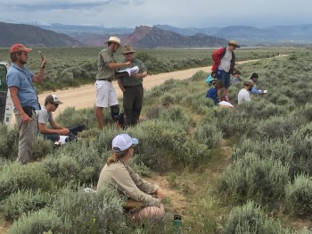 Professor Ron steel and student Mitchell Riegler examine a map near Minnie’s gap, Wyoming.