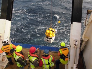 Scientists deploy an ocean bottom seismometer and absolute pressure gauge offshore Gisborne, New Zealand from the R/V Tangaroa. Photo credit: Takeo Yagi, University of Tokyo.