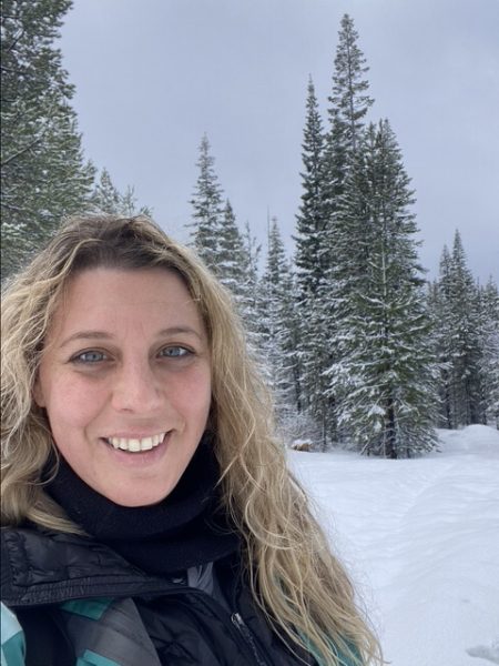 Selfie photo of Daniealla in a snowy forest.