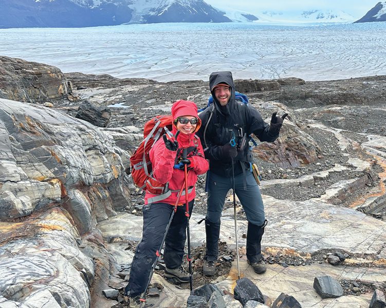 Paleontologist Judith Pardo-Pérez (left) and Sedimentologist Matt Malkowski give a “Hook ’Em” from the field.