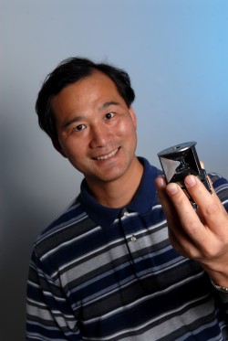 Professor Jung-Fu Lin holding a diamond anvil, a device used in the study to subject rock samples to intense pressures found in the Earth’s core. The University of Texas at Austin Jackson School of Geosciences.
