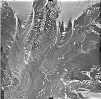 Rock-covered glaciers in Antarctica contain very old, slow-moving ice protected by a layer of rocky debris, similar to the newly revealed features on Mars. Credit: USGS.