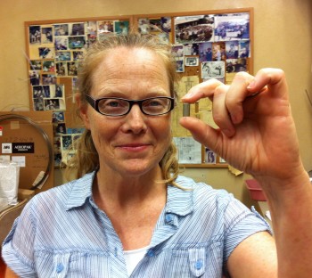 Ph.d. Student Pamela Speciale holding an experimental sample.