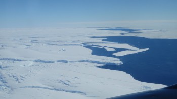 Aerial photo of Totten Glacier’s ice shelf edge taken during one of the team’s geophysical survey flights. Image: Jamin Greenbaum