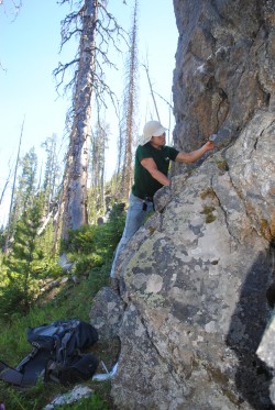 Joey Cleveland (B.S. 2014) conducting field work in Yellowstone as an undergraduate field assistant.