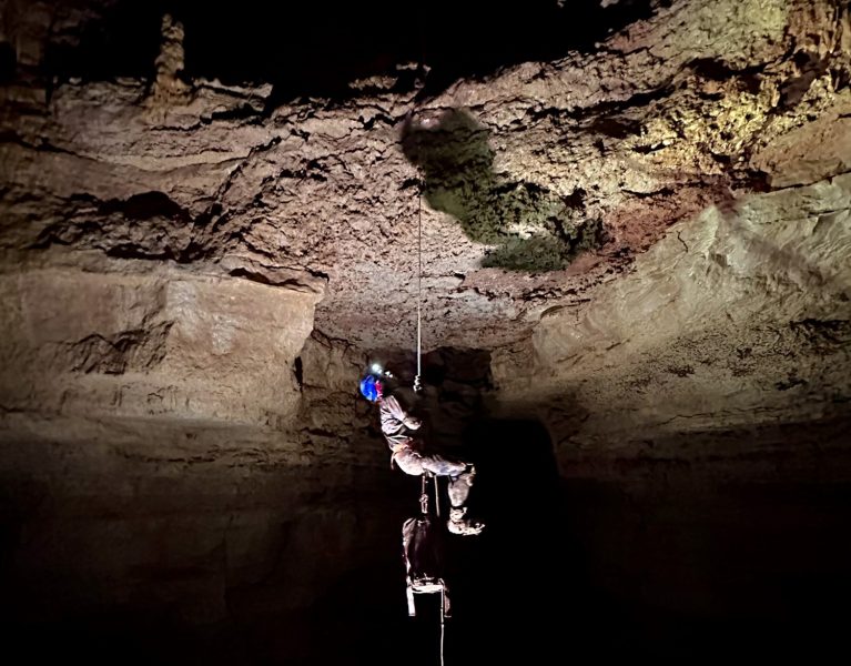 John Moretti descends into a chamber in Natural Bridge Caverns.