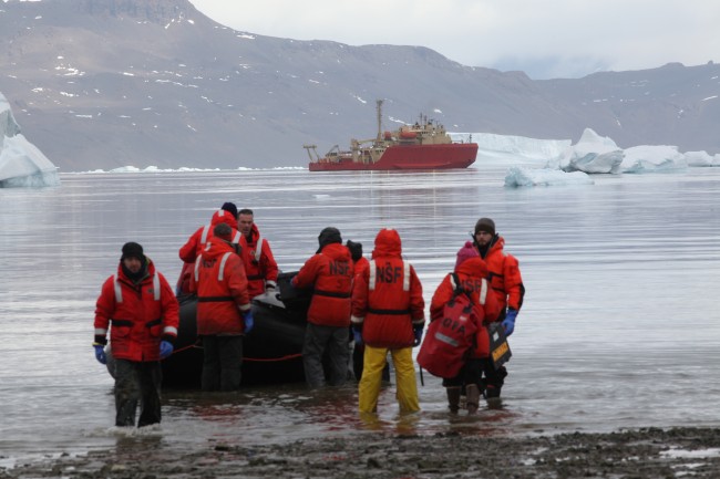 Researchers disembark on Antarctica during an expedition in 2011.