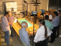 Tim Dooley (left) and other members of the AGL team host visitors for an annual review. Photo by Martin Jackson.