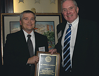 Dean Eric Barron inducts Russ Slayback (right) into the Barrow Founders Circle.