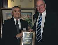 Dean Eric Barron inducts Russ Slayback (right) into the Barrow Founders Circle.
