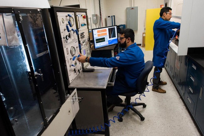 Cockrell School of Engineering graduate students conducting energy research in the Department of Petroleum and Geosystems Engineering. Cockrell School of Engineering