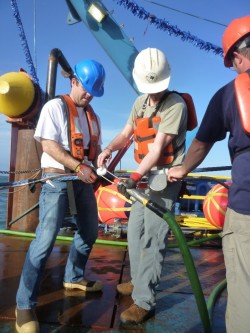 Scientists Attaching Seismic Streamers