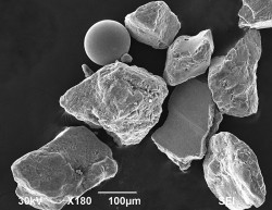 SEM Image of Shrapnel Grains and Iron Bead SEM Image of Shrapnel Grains and Iron Bead