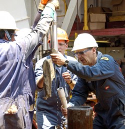 Flemings (right) worked with an engineer to create a pore pressure penetrometer, a needle-like device for measuring pore pressure at great depths. Photo by William Crawford.