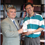 Liang Yang receives the 2007 Walter Award from Dean Barron