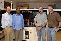 Members of the scanning team included (from left) Ron Harvey, conservator, Lincolnville, Maine; Alemu Admassu, curator, National Museum, Addis Ababa, Ethiopia; John Kappelman, UT Austin; and Richard Ketcham, UT Austin. Photo: Marsha Miller, University of Texas at Austin