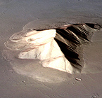 Vast deposits of water ice lie hidden on Mars far from the poles inside "aprons" similar to this one surrounding a mountain in the Hellas region. Image by Ernst Hauber (DLR) using topographic data from the ESA Mars Express spacecraft.