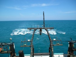 View from the back of the RV Maurice Ewing towing an airgun array and a hydrophone streamer.