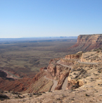 Stephen Grand’s research with colleagues suggests a close relationship between the subsurface stirrings of the planet’s mantle and the warping and resulting erosion of Colorado Plateau regions over time. Image: Valley of the Gods, Chris Sine.	 