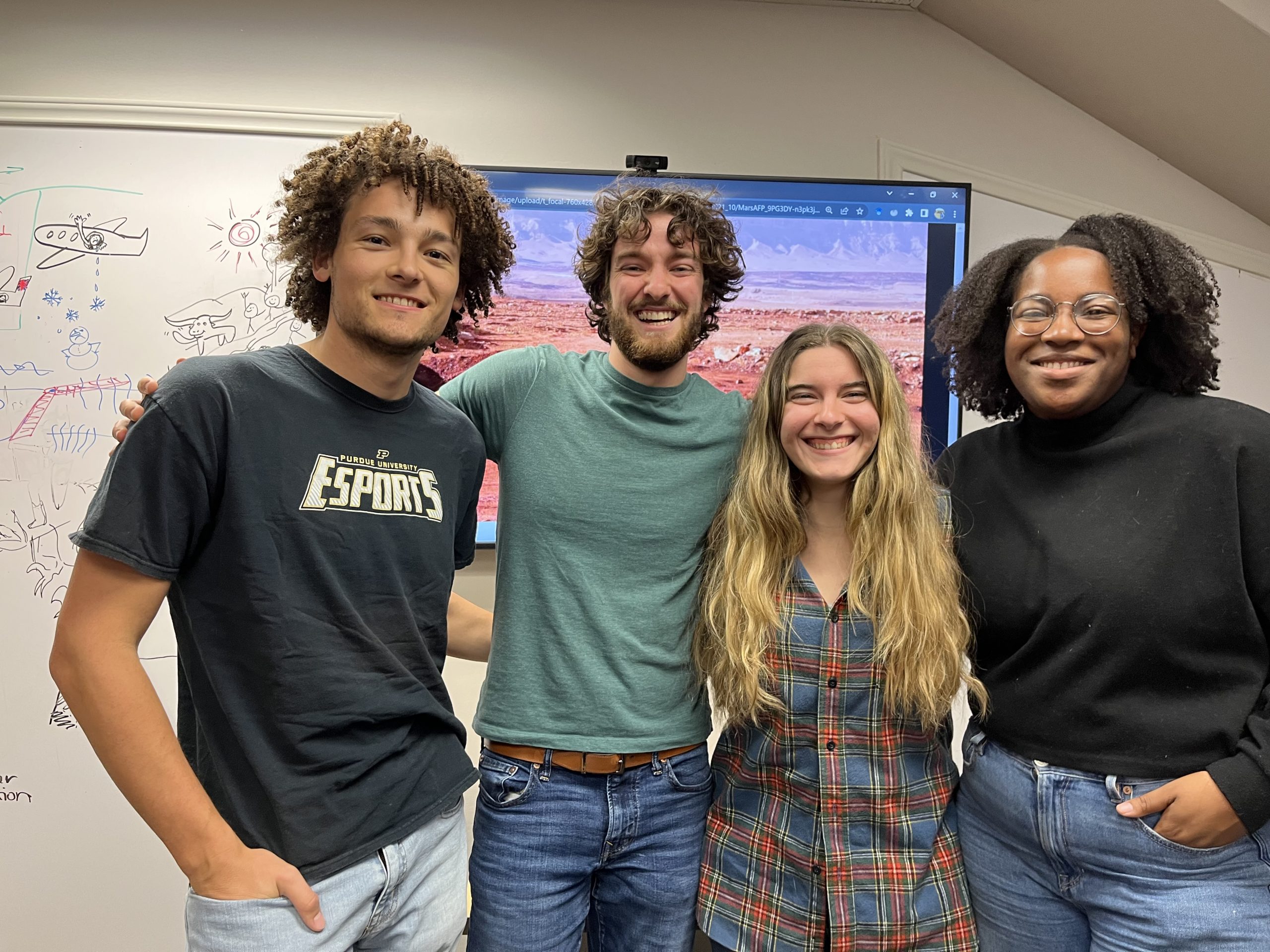 Pictured from left to right: Nick, Noah, Morgan and Michelle stand together smiling