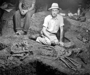 Grayson Meade with Scimitar-toothed cat specimen in Friesenhahn Cave