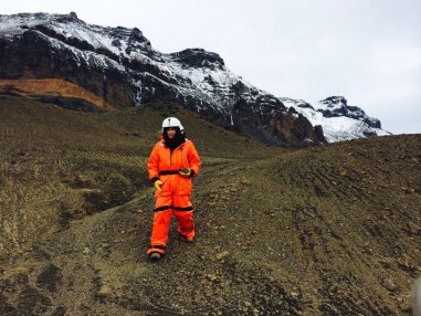 Prospecting for fossils in a flight (Mustang) suit during a brief reconn stopover adds to the feeling of being on another planet.